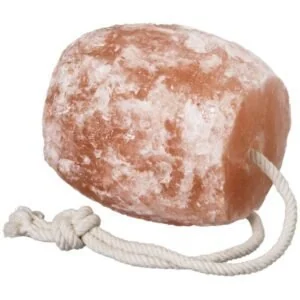 Pink Himalayan rock salt block with a white hanging rope